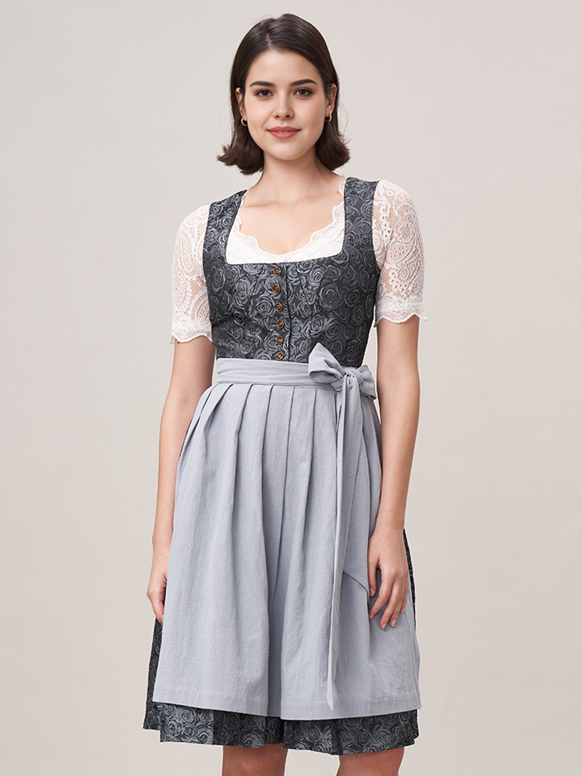 Rote Dirndl mit blauer Schürze