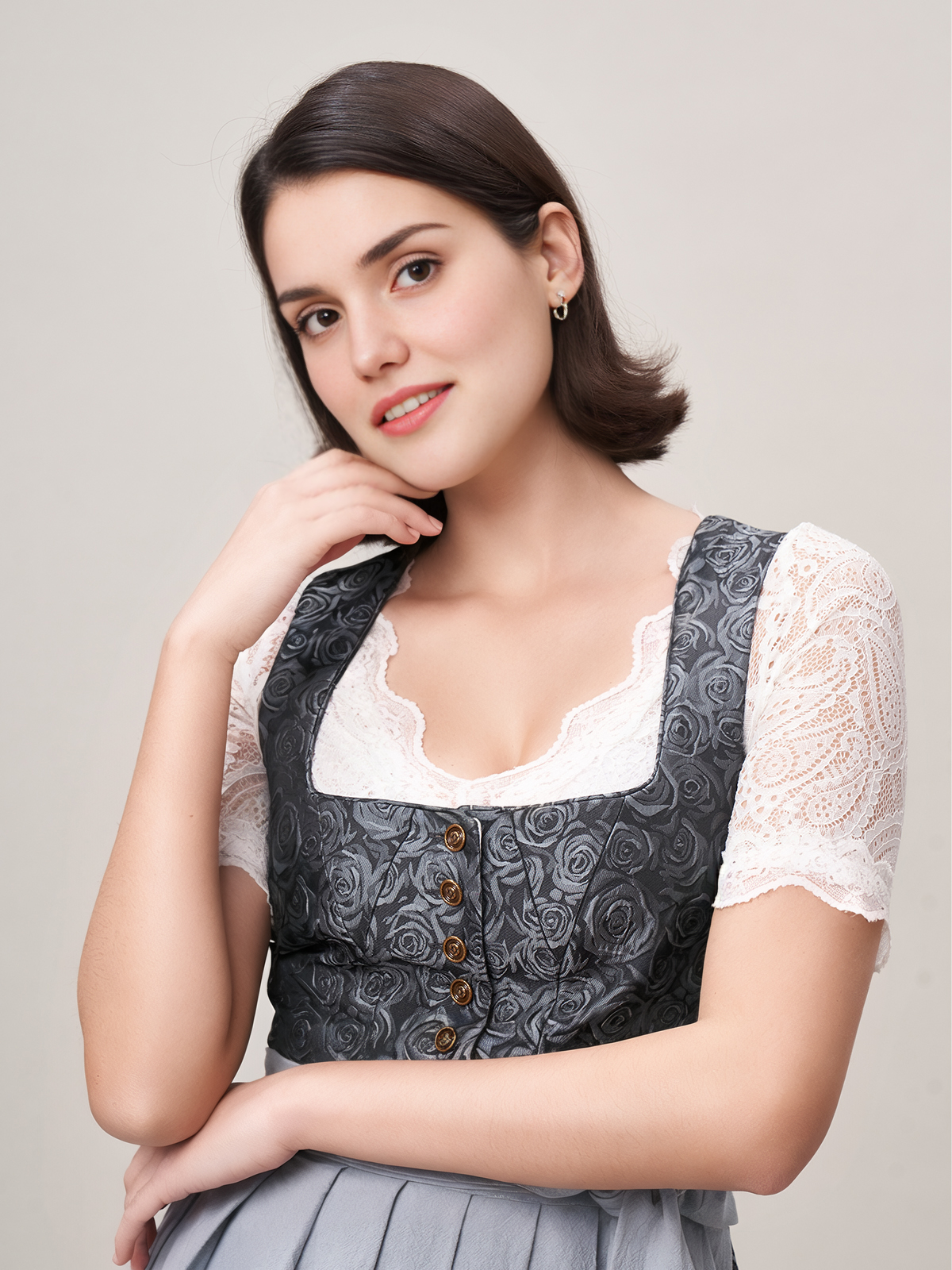Rosa Dirndl mit blauer Schürze
