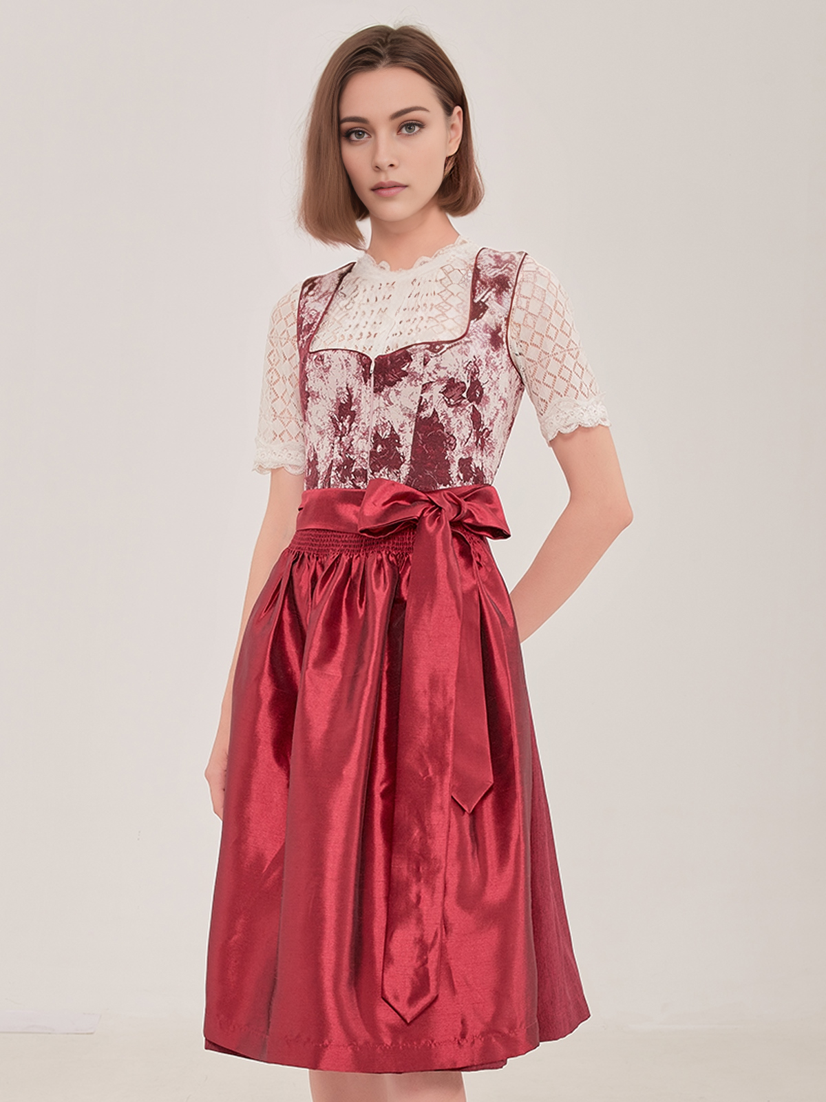 Modernes weißes Dirndl mit roten Akzenten